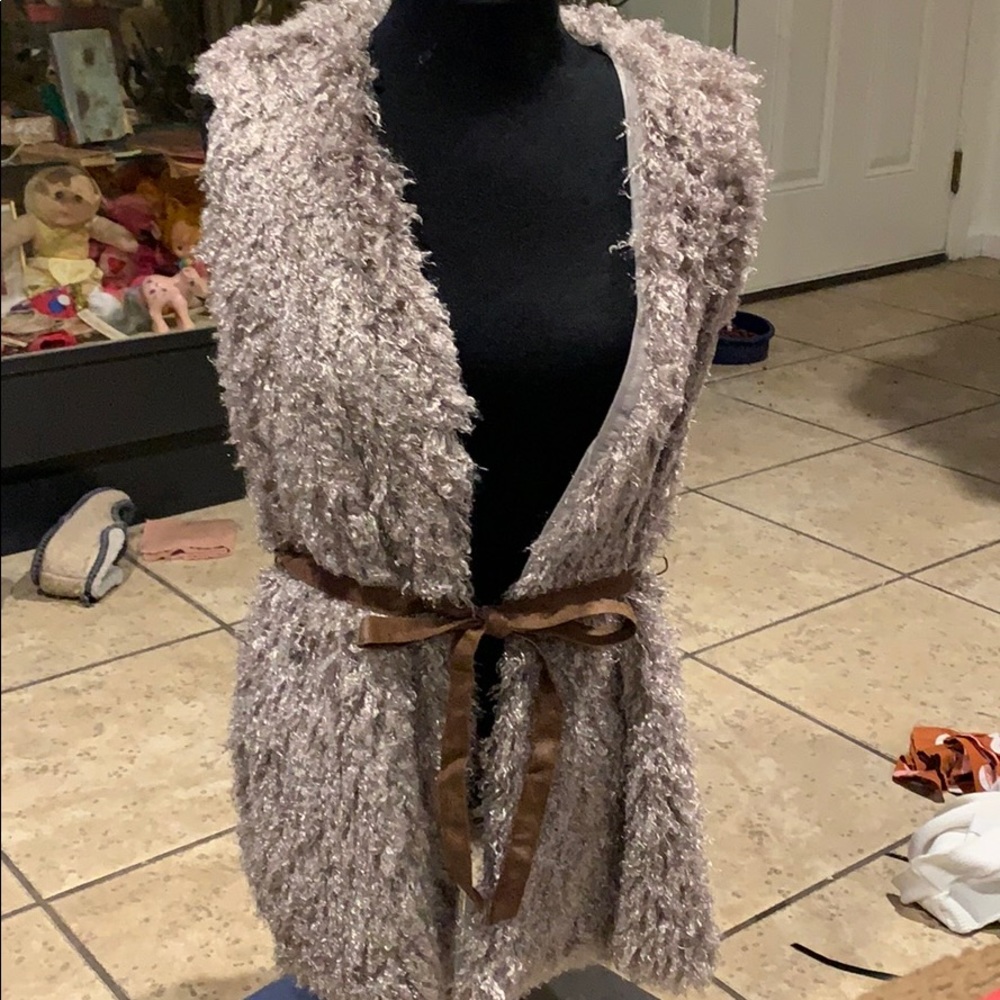 Faux sheep skin vest with Leatherette belt